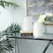 CosmoLiving by Cosmopolitan 7" White Porcelain Contemporary Vase